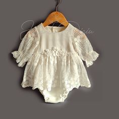 "This is gorgeous  lace baptism bodysuit for baby girl. Bodysuit is made from pretty floral  lace and tulle is perfect for your baby's baptism/ christening/ blessing day!  The set options are: -Baptism romper/ bodysuit -Flower and pearl beads shoes -Headband -Bonnet All garments are made from high quality and soft fabrics. Long skirt is perfect for the ceremony part in the church and can be removed afterwards. Baby stays in cute butterfly romper for her ultimate comfort. Sizes available: ( these are outfit measurements) 0-3 months, ( Chest 16\",) 3-6 months, (Chest 17.5\") 6-9 months (Chest 18.5) 9-12 months (Chest 19.5\") 12-18 months, (Chest 20\") 18-24 months. (Chest 21\")" Summer Baptism Lace Dress With Lace Bodice, Elegant Fitted Baptism Dress For Spring, Lace Baptism Dress With Lace Trim For Party, Spring First Communion Fitted Lace Dress, Lace Dress For First Communion In Summer, Fitted Lace Dress For First Communion In Spring, Spring Fitted Lace Dress For First Communion, Summer Lace Dress With Lace Bodice For Baptism, Elegant Summer Lace Dress For First Communion