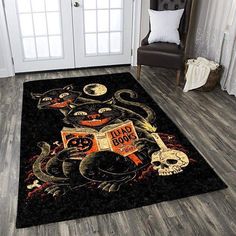 a black area rug with halloween decorations on it