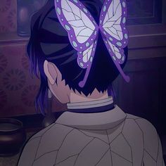 a woman with purple butterflies on her head looking at something in front of her face