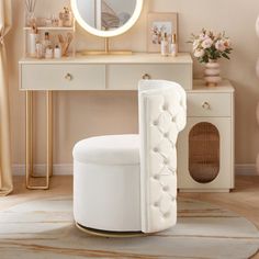 a white chair sitting in front of a mirror on top of a table next to a dresser