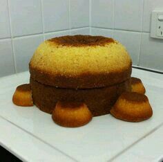 a cake sitting on top of a white counter