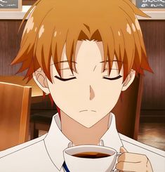 an anime character holding a cup of coffee