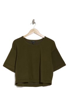 A boxy silhouette defines this versatile top, framed with a cowl neck and three-quarter sleeves. 20 1/5" length (size Small) Cowl neck Three-quarter sleeves 100% polyester Machine wash, tumble dry Imported Modern Cropped Tops For Fall, Spring Boxy Workwear Tops, Spring Boxy Tops For Workwear, Modern Green Tops For Fall, Modern Green Top For Fall, Modern Green Fall Tops, Modern 3/4 Sleeve Tops For Fall, Modern Boxy Fit Tops For Workwear, Cowl Neck Top