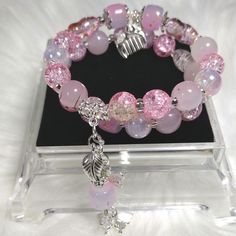 Pink Butterfly Glass Beads Bracelet Sets with Glass Seed's Beads, silver Spacer, silver chain, and silver charms. each Charm is Random. Silver Dangling Beads For Gifts, Silver Dangling Beads As A Gift, Adjustable Silver Charm Bracelet With Colorful Beads, Pink Charm Bracelet With Silver Beads, Ideal For Gifting, Pink Charm Bracelet With Silver Beads For Gift, Pink Charm Bracelet With Silver Beads As A Gift, Adjustable Polished Beads Charm Bracelet Gift, Adjustable Silver Beads Charm Bracelet, Adjustable Bracelets With Dangling Round Beads