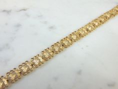 "FOR SALE IS A VINTAGE ESTATE 10K YELLOW GOLD HEART FILIGREE BRACELET. THE BRACELET MEASURES 7 5/8\" LONG FROM THE CLASP BY 1/4\" WIDE, AND WEIGHS 6.8g. CONDITION IS VERY GOOD. THIS WOULD MAKE A LOVELY GIFT AND IS A GREAT VALUE FOR THE MONEY. IF ANY OTHER QUESTIONS, PLEASE ASK. BE SURE TO CHECK OUT SOME OF MY OTHER GREAT ITEMS UP FOR SALE. THANK YOU" Gold Bracelet With Decorative Band For Anniversary, Formal Yellow Gold Bracelet With Decorative Band, Victorian Gold Bracelet For Anniversary, Vintage Gold Filigree Bracelet, Heirloom Style Gold Filigree Bracelet For Formal Occasions, Heirloom Gold Filigree Bracelet For Formal Occasions, Victorian Filigree Bracelets In Yellow Gold, Victorian Yellow Gold Bracelet With Filigree, Victorian Yellow Gold Filigree Bracelets