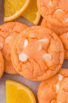 orange cookies with marshmallows and an orange slice