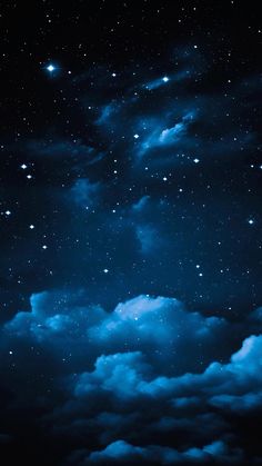 the night sky is filled with stars and clouds, as well as dark blue hues