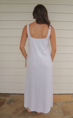 The perfect, casual dress for summer! The Never Better Dress is a lightweight linen blend maxi dress in a shift silhouette. It features a soft square neckline and wide straps - all in a white fabric with pinstripes. Rosalind is 5'8" and is wearing size small size small measurements: 34" bust | 53" length 60% polyester | 40% linen PRODUCTS ON SALE ARE FINAL SALE! Feel free to email us at orders@shopriffraff.com or DM us with any questions regarding fit, styling, or our return policy in general. Casual Maxi Dress With Straight Neckline, Summer Maxi Dress With Straight Neckline For Daywear, Casual Square Neck Maxi Dress For Daywear, Square Neck Linen Maxi Dress For Daywear, White Maxi Dress With Straight Neckline For Spring, Casual Maxi Dress With Square Neck For Daywear, White Spring Maxi Dress With Straight Neckline, Casual White Maxi Dress With Straight Neckline, White Linen Dress With Square Neck For Summer