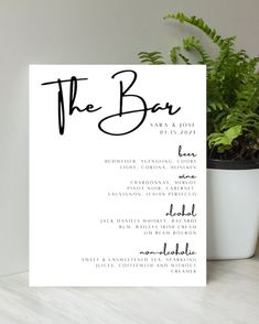 the bar menu is shown next to a potted plant