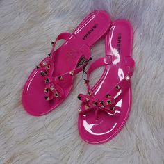 These Pink Thong Sandals Are Perfect For The Spring And Or Summertime Cute With A Pink Bow And Gold Studs Where To The Beach Or To The Pool Or Just Out For Casual Cute Day Size 7 These Are New But They Will Not Have A Tag Attached Adjustable Pink Jelly Sandals For Beach, Pink Jelly Sandals With Round Toe For Summer, Pink Jelly Sandals For Summer, Pink Round Toe Jelly Sandals For Summer, Trendy Pink Sandals For Vacation, Pink Open Toe Flip Flops For Summer, Trendy Pink Jelly Sandals For Summer, Trendy Pink Jelly Sandals With Round Toe, Summer Pink Synthetic Jelly Sandals