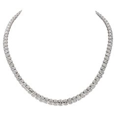 This exquisite Riviera Necklace consists of 92 oval-cut diamonds, with a combined weight of 40.65 carats. Notably, 75 of these diamonds have received GIA certification, affirming their exceptional quality with color grades ranging from D to G and clarity grades falling within the IF-SI1 range. The necklace is elegantly crafted from 18kt white gold, boasting a total weight of 45.93 grams. In terms of dimensions, it measures a graceful 16.5 inches in length, equivalent to 42 centimeters. Immerse yourself in the opulence and refinement embodied by Spectra Fine Jewelry's 40.65-carat Oval Diamond Riviera Necklace. It stands as a mesmerizing testament to the skill and allure of fine jewelry, boasting exceptional diamonds, a magnificent design, and impeccable craftsmanship. This necklace is desti Diy Wedding Hair, Expensive Jewelry, Oval Cut Diamond, Name Gifts, Family Heirloom, Design Jewelry, Oval Diamond, Watches Jewelry, Girls Best Friend