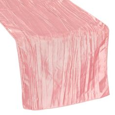 a pink table runner on a white background