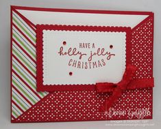 a handmade christmas card with red and green stripes