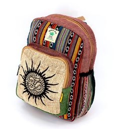 A versatile and beautiful Sun & OM Print Hemp Backpack made with 100 percent natural THC-free Himalaya hemp. Stitched and assembled by the most talented artisans in Nepal. The product is double stitched with the highest quality Himalaya hemp. The product consists of double zippers while also having completely adjustable shoulder straps which ensures that the bag is one size fits all product. This double-strapped backpack is a product that consists of various compartments which can be of multiple Cheap Festival Backpack, Eco-friendly Rectangular Backpack With Adjustable Strap, Eco-friendly Brown Backpack, Eco-friendly Green Backpack, Eco-friendly Multicolor Rectangular Backpack, Eco-friendly Rectangular Multicolor Backpack, Eco Friendly Backpack, Hemp Backpack, Leaf Symbol