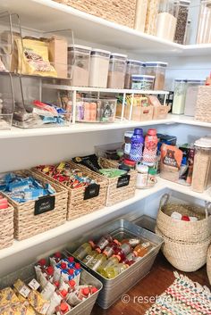 an organized pantry with baskets and food items