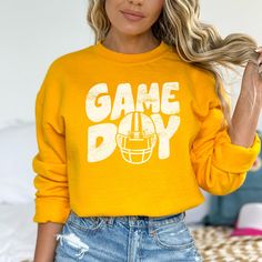 Perfect for any football fan! Lots of colors to choose from! Show your team spirit with this awesome sweatshirt! 50/50 Cotton & Polyester Blend.  Fit: All shirts are unisex fit, true to size, loose fit. Recommend going up 1-2 sizes for an oversized look. Please check the size chart. If you have any questions, please contact us. Please check your address to make sure it is your current address. Care Instructions:  For the best and lasting results, wash in cold water inside out. No bleach. Dry on low heat or hang dry. Do not iron over design.  Returns: Because this item is made to order, all sales are final. No returns are accepted.  Please let us know if you have a problem with your order and we will try to correct the issue.  Shipping: Orders usually ship within 3 business days. Please all School Spirit Sweatshirt With Team Logo For Game Day, Game Day School Spirit Sweatshirt With Team Logo, Letter Print Sweatshirt For Game Day During Football Season, Football Season Sweatshirt In Team Colors With Team Name, Team Spirit Letter Print Sweatshirt For Football Season, Team Spirit Sweatshirt For Football Season, Fall Team Spirit Sweatshirt With Screen Print, Team Spirit Sweatshirt For Game Day With Letter Print, Football Season Sweatshirt For Sports Events