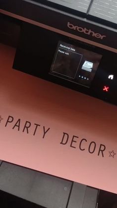 a pink sign that says party decor on it