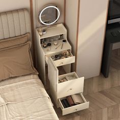 a small bedroom with a bed, night stand and drawers on the floor next to it