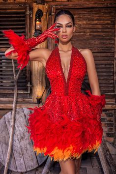 Embroidered with red pearls and beads.• Open chest• Open back• Fitted waist• Feathers • Gloves Feather Inspired Fashion, Phoenix Inspired Dress, Red Fire Dress, Bird Inspired Fashion, Fire Inspired Dress, Fire Inspired Outfits, Phoenix Character, Red Feather Dress, Bird Outfit