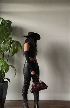 Cowboy Boots Outfit Baddie, Cowboy Boots Leather Pants, Black And Gold Cowgirl Outfit, Leather Pants Cowboy Boots Outfit, Cowboy Boots Pants Outfit, Leather Pants With Cowboy Boots, Cowgirl Outfit Ideas For Women, Leather Cowboy Outfit, Cowgirl Black Outfit