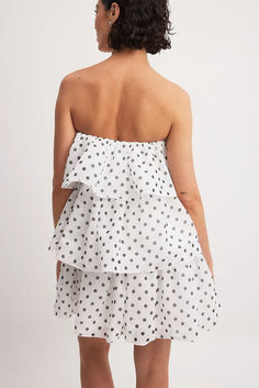 Chiffon Layered Strapless Mini Dress Summer Strapless Chiffon Dress With Ruffles, Flirty Polka Dot Mini Dress For Summer, Summer Strapless Chiffon Mini Dress, Strapless Chiffon Mini Dress With Ruffles, Strapless Chiffon Mini Dress For Summer, Polka Dot Summer Mini Dress, Flowy Strapless Mini Dress With Ruffles, Summer Flowy Strapless Mini Dress, Beach Strapless Dress With Ruffle Hem In Mini Length