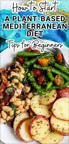 a white plate topped with potatoes and green beans