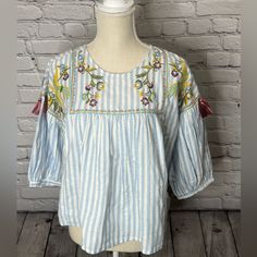 Nwt Forever 21 Contemporary Size Large Round Neck 3/4 Sleeves Embroidered Flowers And Tassels 23”- Bust Area Under Arm To Under Arm 19.5”- Length Laying Flat New- No Signs Of Wear Or Flaws Forever 21 Relaxed Fit Tops For Spring, Multicolor Embroidered Cotton Shirt For Spring, Floral Embroidered Top For Spring Brunch, Spring Cotton Embroidered Top, Spring Cotton Blouse With Multicolor Embroidery, Spring Embroidered Blue Tops, Blue Embroidered Spring Tops, Blue Embroidered Tops For Spring, Blue Embroidered Tops For Day Out