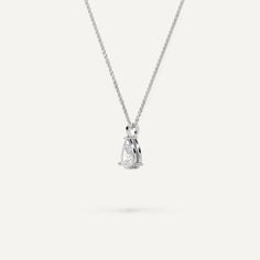 This solitaire, pear-shaped diamond pendant necklace offers a touch of refined simplicity, perfect for those who appreciate a delicate and timeless design. The minimalist diamond pendant comes with a 16 inch length necklace, adjustable to 18 inches. Natural and clarity enhanced diamonds are F-G/SI1-SI2 grade while lab grown diamonds come F-G/VS1-VS2 graded. Unique Diamond Pendant, Single Diamond Necklace, Round Diamond Pendant, Teardrop Diamond, Gold Starburst, Diamond Tennis Necklace, 16 Inch Necklace, Platinum Jewelry, Teardrop Pendant