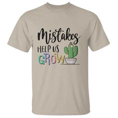 a t - shirt with the words,'mistkes help us grow'on it