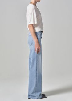 The Loli features an ultra-flattering mid-rise waist that sits higher up on the hip with an easy, relaxed wide leg. The 32" inseam lengthen the leg for a look that can be easily dressed up or down. This fit is true to size. Looks Like: Light indigo with fading and finished hems Feels Like: Signature soft stretch denim designed to hold its shape all-day From our HUMANITY Collection Relaxed High Waist Wide Leg Pants For Spring, Elevated Casual Wide Leg Bottoms, Relaxed Fit Wide-leg Flare Jeans, Modern Full Length Bottoms For Everyday, Mid-rise Wide Leg Pants For Summer, Relaxed Fit Wide Leg Bottoms For Elevated Casual, Relaxed Straight Leg Bottoms For Elevated Casual, Relaxed Wide Leg Everyday Bottoms, Relaxed Wide Leg Bottoms For Everyday