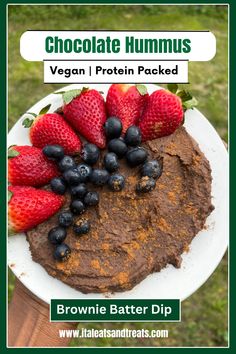 chocolate hummus vegan / protein packed brownie batter dip with strawberries and blueberries on top