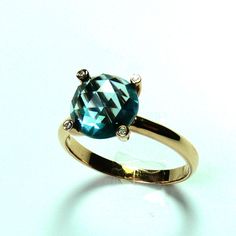 18K London Blue Topaz 9mm Accented with by ShowroomJewelry on Etsy, $125.00 Diamond Cut Blue Topaz Ring, Diamond Cut Topaz Ring, Elegant Faceted Sapphire Ring, Faceted Crystal Ring For Formal Occasions, Round Diamond Cut Topaz Ring, Classic Round Faceted Topaz Ring, Blue Faceted Round Sapphire Ring, Elegant Faceted Blue Topaz Rings, Blue Faceted Sapphire Ring