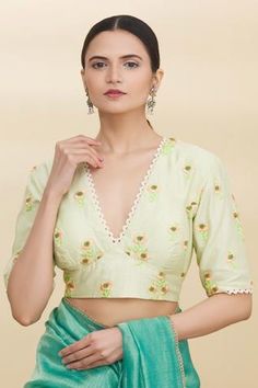 Mint green blouse with all-over multi-color floral motif embroidery and lace trim sleeve hem.
Component: 1
Embroidered
Neckline: V Neck
Sleeve Length: Half
Fabric: Chanderi
Color: Green
Plunging neck
Note: Saree worn by the model is not for sale - Aza Fashions Kurta Half Sleeves Design, Thread Embroidery Blouse Designs, Yellow Blouse Designs, Mint Green Blouse, Light Green Blouse, Mint Green Blouses, Drape Sarees, Motif Embroidery, Saree Blouses Online