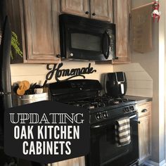 a kitchen with an oven, microwave and cabinets in it that says updating oak kitchen cabinets