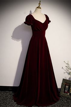 Elegant burgundy velvet long formal dress features with sweet neck, short sleeves and lace up back. SKU: 2336 Free Shipping Ship in 7-10 days Material: Velvet. Fully lined for added comfort. Built in bra US 2 - US 16. Refer to our size chart to choose correct size. We offer free returns in 7 days. Please refer to our return policy page for more details. If you have any questions, please feel free to contact us: service@dressesforparty.com. Hoco Dresses Short Vintage, Fitted Long Ball Gown For Formal Occasions, Formal Full Length Fitted Bridesmaid Dress, Fitted V-neck Ball Gown For Evening, Fitted Floor-length Bridesmaid Dress For Formal Occasions, Fitted Floor-length Mother Of The Bride Dress, Fitted Floor-length Ball Gown For Banquets, Red Velvet Dress Long Sleeve, Burgundy Fall Dress