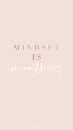 the words mindset is everything in white and pink on a beige background with an image of