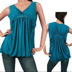 New Womens Teal Blue Sleeveless V-Neck Empire Waist Roman Goddess Princess Top/Blouse - Shell Tops, Long Tops, Fancy Tops. With Ruched Gathered Fabric Both In Front And Back With Silver Color Studs And Chains Embellishments, And Raw Edges Hems. Material Is 68% Rayon, 25% Polyester, 7% Spandex. Womens Tops Great As Casual Wear, Going Out Tops, Party Tops, Summer Tops, Fall Season Tops, Etc. Hurry! We Have Limited Stocks Left Of This Item! Size (Womens): Small (S) Actual Measurements: Bust (Armpit Elegant Blue V-neck Tank Top, Blue V-neck Tank Top For Night Out, Blue V-neck Vest Top, Blue V-neck Tank Top For Party, Roman Goddess, Fancy Tops, Shell Tops, Going Out Tops, Party Tops