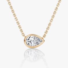 The Bezel Solitaire Necklace combines vintage-inspired detail and modern appeal together for a look that’s timelessly elegant. Pear Shaped Diamond Necklace, Jewellery Showroom, Solitaire Necklace, Bespoke Rings, Solitaire Necklaces, Pear Shaped Diamond, Accessories Jewelry Necklace, Pear Cut, Bezel Setting