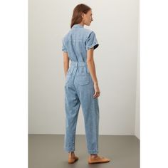 Blue denim (100% Cotton). Jumpsuit. Short sleeves. V-neck. Front zipper closure. 17.5" from shoulder to hemline. 28" inseam. 12" rise. Imported. Fitted Casual Denim Jumpsuit With V-neck, Casual V-neck Denim Jumpsuit With Pockets, Spring V-neck Denim Jumpsuit With Pockets, Casual Fitted Denim Jumpsuit With V-neck, Fitted Denim Jumpsuit With V-neck In Casual Style, Casual Blue Denim Jumpsuit With V-neck, Casual Blue Denim Jumpsuit V-neck, Fitted Denim Jumpsuit With V-neck, Fitted V-neck Denim Jumpsuit