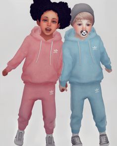 two children in matching outfits standing next to each other