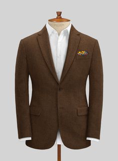 When you look good, you feel good, and that's exactly what you'll experience when wearing our Naples Caffe Brown Tweed Suit. Expertly crafted from pure wool, the solid pattern and rich caffe brown color make it a staple in work fashion. It's perfect for businesses seeking corporate attire that exceeds the demands of a busy workplace or any special events, whether they're casual or formal. 
 
 Look Includes   Naples Caffe Brown Tweed Fabric  Two Button Jacket Style  Notch Lapel   Horn   Brown  Bu Brown Tweed Jacket With Notch Lapel, Brown Tweed Jacket, High-end Brown Tweed Jacket, Brown Single-breasted Tweed Suit, Brown Single-breasted Tweed Jacket, Brown Tweed Suit, Luxury Brown Menswear-inspired Tweed Jacket, Grey Tweed Suit, Green Velvet Jacket