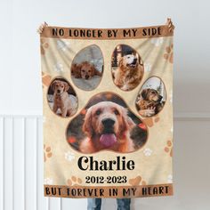 a dog's paw is shown with four dogs on it and the words, no longer by my side charlie 2012 - 29 but forever in my heart