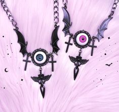 Creepycute necklace with EYES bat wings cross o-ring. Perfect jewelry for styles like: cute harajuku, menhera, kawaii, gothic, pastel goth, altcore 2 color of EYE: PINK / TURQUOISE LENGHT: ~45cm (17.72) plus 5cm (1.97) of regulation if you're looking for more necklaces: https://www.etsy.com/shop/MiyakaBizu?ref=seller-platform-mcnav&section_id=22229407 ATTENTION! Estimate shipping time is about 1-2 weeks to EU and 3-5 weeks to outside the EU. If you don't receive your order within limit time plea Emo Necklaces For Halloween And Alternative Fashion, Harajuku Style Black Jewelry, Emo Jewelry For Halloween Cosplay, Harajuku Style Halloween Jewelry Gift, Pink Punk Halloween Jewelry, Pink Punk Style Necklace For Party, Pink Punk Necklace For Party, Pink Gothic Jewelry For Halloween, Handmade Pink Gothic Jewelry