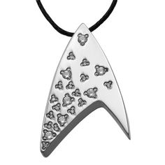 The Star Trek Unisex White Crystal Stainless-Steel Pendant is a stylish accessory and makes a suitable gift for any Trekkie. It hangs on a 24 inch chain and is made from durable and shiny stainless steel in the shape of the Starfleet insignia. This Star Trek pendant is also decorated with white crystals scattered across the front. It is suitable for everyday wear. Size: one size. Color: Metal Type. Age Group: adult. Star Trek Merchandise, Star Trek Universe, White Crystals, Stainless Steel Pendant, Unisex Jewelry, Crystal Necklace Pendant, White Crystal, Stainless Steel Jewelry, Stylish Accessories