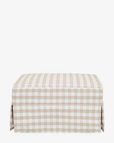 a tan and white checkered bench cushion