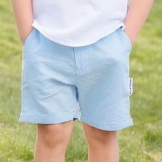 Geggamoja® of Sweden These comfortable, breezy shorts dress up any summer day! Made of sustainably sourced cotton and linen in a 50/50 blend. Lightweight, breathable shorts. 50% cotton, 50% linen. Two front pockets, one back. Front zipper. Machine wash, warm. (40 C°/ 104° F) Sizes (European size is based on child's full height in centimeters - see below) 74/80 (6-12+ mo) 86/92 (12-24 mo) 98/104 (3-4 yr) Conversion to height in inches 74/80 = 29 / 31.5 inches 86/92 = 33.5 / 36.5 inches 98/104 = 3 Cotton Shorts For Playwear, Cotton Bottoms For Summer Playwear, Summer Cotton Bottoms For Playwear, Playful Solid Color Bottoms For Summer, Summer Bottoms With Elastic Waistband For Playtime, Spring Playtime Bottoms With Pockets, Spring Playwear Shorts With Pockets, Blue Bottoms With Pockets For Playwear, Playful Bottoms For Summer Playwear