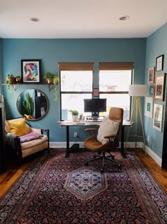 a living room filled with furniture and a rug