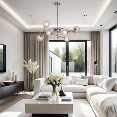 a living room filled with white furniture and lots of windows