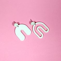 These simple, modern earrings make a statement with their mismatched look. Laser cut from light mint colored acrylic, with a matte finish. LightweightHypoallergenic Stainless Steel post with rubber back and butterfly back 45mm x 33mm1.7" x 1.3" (approximately) All Crafted products are handmade in small batches from my home studio in northern California. Modern White Geometric Earrings, Arch Earrings, Colored Acrylic, Steel Post, Mint Color, Modern Earrings, New Instagram, Small Batches, Northern California