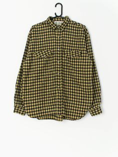 Vintage wool check flannel shirt in yellow and black. This shirt has a fabulous checked design in bright yellow and black and features two chest pockets with button closure and long sleeves. Made from a lovely thick lightweight wool mix, which makes this shirt ideal for layering or as an overshirt. Circa 1980's. Made in Italy.  Our recommended size: Large  Label says: Large  Condition: Very good  Material: 70% lana (wool) 30% acrylic  Measurements in inches: Pit to pit: 24.5 Shoulders: 21.5 Fron Fall Gingham Cotton Shirt, Plaid Flannel Work Shirt, Plaid Flannel Workwear Shirt, Plaid Flannel Shirt For Work, Gingham Cotton Flannel Shirt For Fall, Fall Gingham Cotton Flannel Shirt, Plaid Cotton Flannel Shirt For Work, Collared Gingham Shirt For Fall, Yellow Long Sleeve Flannel Shirt For Fall